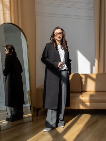 Black check coat with broad shoulders by Prada